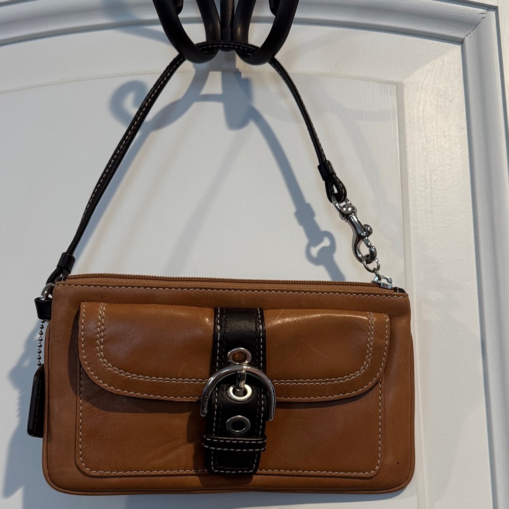 Coach Brown and Black Leather Soho Wristlet. Excellent condition!
